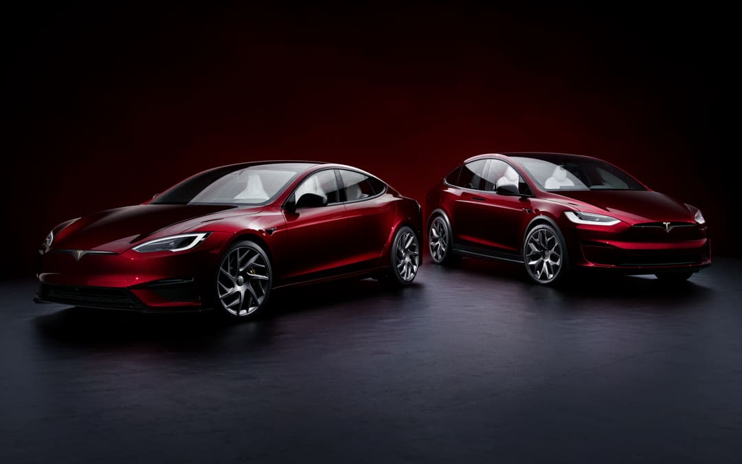 Signature Edition Model S and Model X in deep red, studio shot