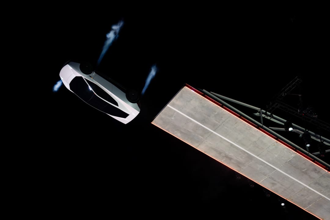 Tesla Roadster. Night demo: inverted at the top of the ramp, thrusters firing