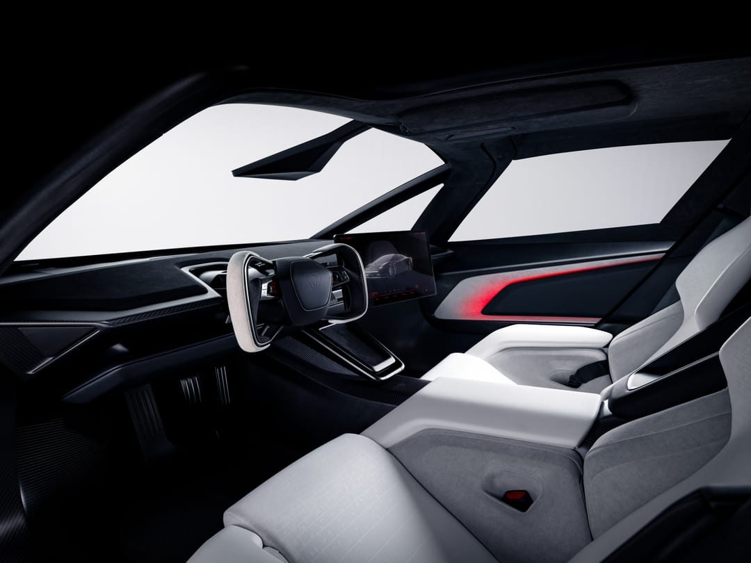 Tesla Roadster. Interior: wide cabin view with yoke