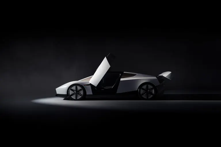 2026 Tesla Roadster in a dark studio, side profile with doors and rear wing raised (Tesla photo)